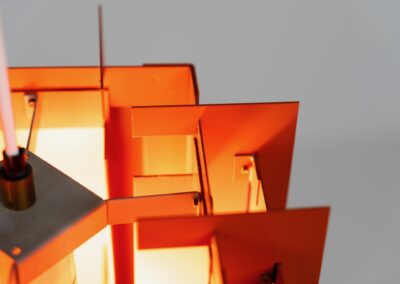 Extremely rare “Octagon” pendant light by Lyfa (Denmark, 1960s). What a spectacular piece! It’s made out of multiple steel slats lacquered in orange and grey, which gives an amazing lighting. It looks different from every angle and will probably never bore you! Newly rewired and in splendit condition. It weighs almost 5kg so make sure the ceiling can support it.