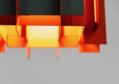 Extremely rare “Octagon” pendant light by Lyfa (Denmark, 1960s). What a spectacular piece! It’s made out of multiple steel slats lacquered in orange and grey, which gives an amazing lighting. It looks different from every angle and will probably never bore you! Newly rewired and in splendit condition. It weighs almost 5kg so make sure the ceiling can support it.