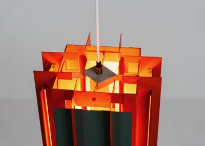 Extremely rare “Octagon” pendant light by Lyfa (Denmark, 1960s). What a spectacular piece! It’s made out of multiple steel slats lacquered in orange and grey, which gives an amazing lighting. It looks different from every angle and will probably never bore you! Newly rewired and in splendit condition. It weighs almost 5kg so make sure the ceiling can support it.