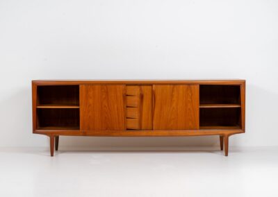 Sideboard by Gunni Omann for Axel Christensen, ACO (Denmark, 1960s). A wonderful teak sideboard with a lot of details and organic finishes. The drawers and handles on this one are just amazing. A high quality Danish piece in very good condition. It has some minor traces of age and use.