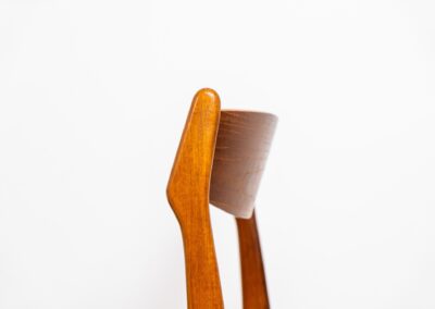 Set of 4 stunning dining chairs by S. burchardt-Nielsen (Denmark, 1960s). A beautiful solid teak chair with organic shapes and a very nice woodgrain. They are newly upholstered in a grey fabric. In very good condition.