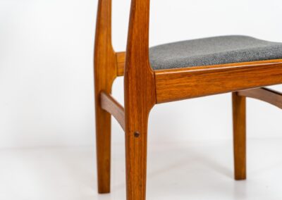 Set of 4 stunning dining chairs by S. burchardt-Nielsen (Denmark, 1960s). A beautiful solid teak chair with organic shapes and a very nice woodgrain. They are newly upholstered in a grey fabric. In very good condition.