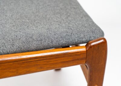 Set of 4 stunning dining chairs by S. burchardt-Nielsen (Denmark, 1960s). A beautiful solid teak chair with organic shapes and a very nice woodgrain. They are newly upholstered in a grey fabric. In very good condition.