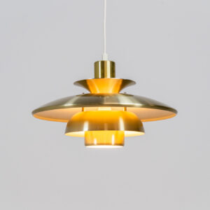 Brass colored pendant light by Lyskaer (Denmark, 1970s). A beautiful lamp made out of four aluminium shades with a brass colored exterior. Newly rewired and in very good condition. Labeled by maker.