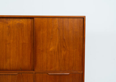 Sideboard by E.W. Bach for Sejling Skabe (Denmark, 1960s). A very elegant piece with ideal dimensions. It contains three sliding doors and three drawers with nice sculptural handles. The inside has lots of storage space with adjustable shelves and 2 small drawers aswel. An amazing Danish quality piece ready for another lifetime! In very good condition with some minor repair marks.