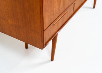 Sideboard by E.W. Bach for Sejling Skabe (Denmark, 1960s). A very elegant piece with ideal dimensions. It contains three sliding doors and three drawers with nice sculptural handles. The inside has lots of storage space with adjustable shelves and 2 small drawers aswel. An amazing Danish quality piece ready for another lifetime! In very good condition with some minor repair marks.