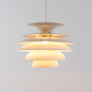 “Barcelona” pendant light by Bent Karlby for Lyfa (Denmark, 1960s). A beatiful design classic made up of six aluminium shades that create a nice indirect light distribution. A true eye catcher. In good vintage condition!