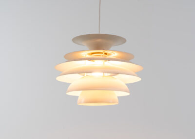 “Barcelona” pendant light by Bent Karlby for Lyfa (Denmark, 1960s). A beatiful design classic made up of six aluminium shades that create a nice indirect light distribution. A true eye catcher. In good vintage condition!
