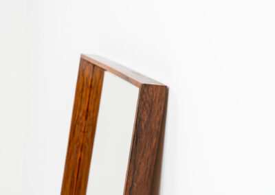 Mid-Century wall mirror in rosewood by Aarhus Glassliberi (Denmark, 1960s). Perfectly built, amazing woodgrain and very timeless. In good condition. Labeled on the back.