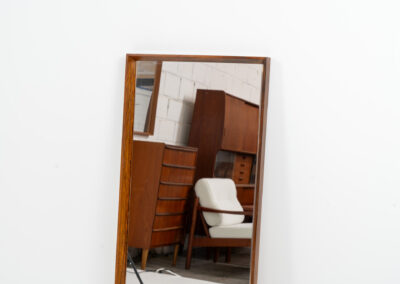 Mid-Century wall mirror in rosewood by Aarhus Glassliberi (Denmark, 1960s). Perfectly built, amazing woodgrain and very timeless. In good condition. Labeled on the back.