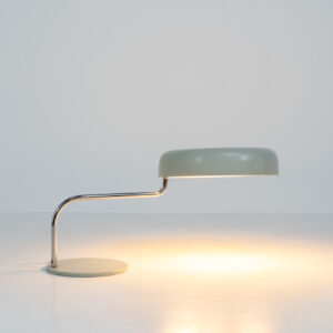 Remarkable Italian desk lamp, 1970s. We don’t know who made it but it’s an amazing piece. It has a heavy steel base, a chrome stand and an aluminium shade. It’s adjustable in many angles. In very good vintage condition.