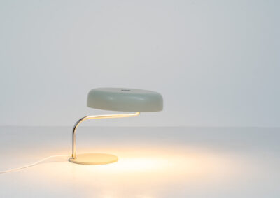 Remarkable Italian desk lamp, 1970s. We don’t know who made it but it’s an amazing piece. It has a heavy steel base, a chrome stand and an aluminium shade. It’s adjustable in many angles. In very good vintage condition.