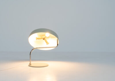 Remarkable Italian desk lamp, 1970s. We don’t know who made it but it’s an amazing piece. It has a heavy steel base, a chrome stand and an aluminium shade. It’s adjustable in many angles. In very good vintage condition.