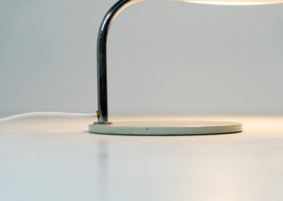 Remarkable Italian desk lamp, 1970s. We don’t know who made it but it’s an amazing piece. It has a heavy steel base, a chrome stand and an aluminium shade. It’s adjustable in many angles. In very good vintage condition.