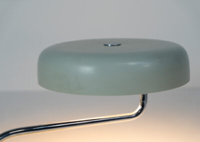 Remarkable Italian desk lamp, 1970s. We don’t know who made it but it’s an amazing piece. It has a heavy steel base, a chrome stand and an aluminium shade. It’s adjustable in many angles. In very good vintage condition.