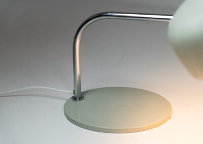 Remarkable Italian desk lamp, 1970s. We don’t know who made it but it’s an amazing piece. It has a heavy steel base, a chrome stand and an aluminium shade. It’s adjustable in many angles. In very good vintage condition.
