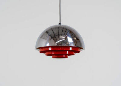 Stunning “Milieu” pendant light by Jo Hammerborg for Fog & Mørup (Denmark, 1960s). The condition of this piece is just amazing! It’s made out of a chrome lamp shade and deep orange metal light diffusers. Beautiful lighting, beautiful design and splendid original condition.