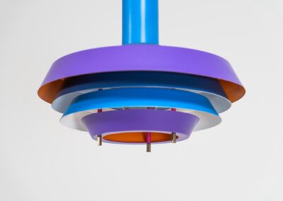 Model 705 pendant light by Lyskaer (Denmark, 1960s). This space age beauty contains 4 aluminium shades, lacquered in blue, purple and an orange interior. Newly rewired and restored to perfection.