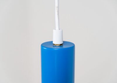 Model 705 pendant light by Lyskaer (Denmark, 1960s). This space age beauty contains 4 aluminium shades, lacquered in blue, purple and an orange interior. Newly rewired and restored to perfection.