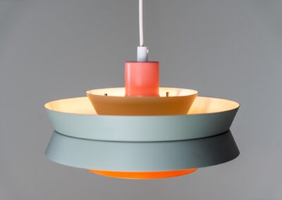 Colourful “Trava” pendant light designed by Carl Thore for Granhaga (Sweden, 1960s). This lamp is surely an eye catcher! It is made out of four aluminium shades laquered in of pink, grey and orange. The lamp is rewired and restored to perfection!
