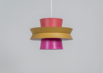 Colourful “Trava” pendant light designed by Carl Thore for Granhaga (Sweden, 1960s). This lamp is surely an eye catcher! It is made out of four aluminium shades laquered in two tints of pink, ocher yellow and an orange interior. The lamp is rewired and restored to perfection!