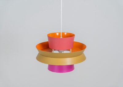 Colourful “Trava” pendant light designed by Carl Thore for Granhaga (Sweden, 1960s). This lamp is surely an eye catcher! It is made out of four aluminium shades laquered in two tints of pink, ocher yellow and an orange interior. The lamp is rewired and restored to perfection!