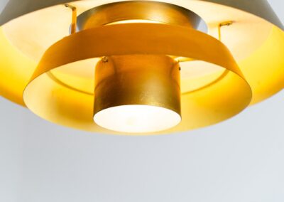 Nova pendant light by Jo Hammerborg for Fog & Mørup (Denmark, 1960s). A wonderful design classic. It is made out of solid brass and has a beatiful patina. In original and very good vintage condition.