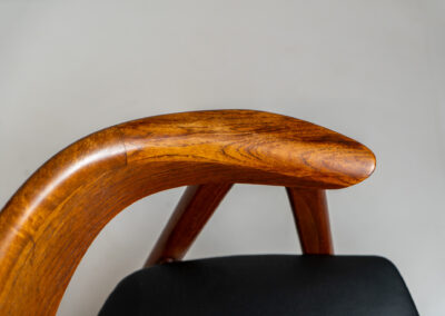 Model 52 armchair by Erik Kirkegaard for Høng Stolefabrik (Denmark, 1960s). What a stunning piece of art… The Model 52, also known as the Compass chair is a hard to find chair made out of solid teak. The details on this one are just amazing and the generously curved and rounded backrest makes it a pleasure to sit in! The seat is newly upholstered in real leather and it is in very good condition!