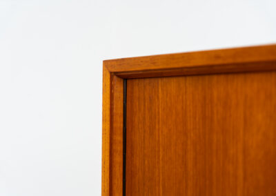 Midcentury cabinet by Lothar Wegner (Germany, 1960s). A sleek and convenient piece with a wonderful and natural woodgrain. The lock still works very smoothly and the original key is included. In very good condition.