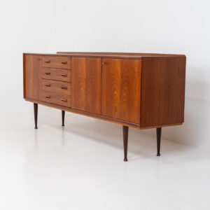 Teak sideboard by van Pelt (Belgium, 1960s). Clearly a very aesthetic and well-built piece with nice sculptural handles and a mesmerizing woodgrain. This beauty contains four drawers and three doors with more than enough storage space inside. The locks still work smoothly and two original keys are included. In splendid condition!
