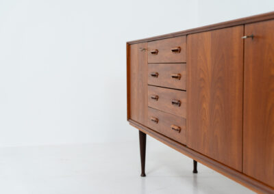 Teak sideboard by van Pelt (Belgium, 1960s). Clearly a very aesthetic and well-built piece with nice sculptural handles and a mesmerizing woodgrain. This beauty contains four drawers and three doors with more than enough storage space inside. The locks still work smoothly and two original keys are included. In splendid condition!