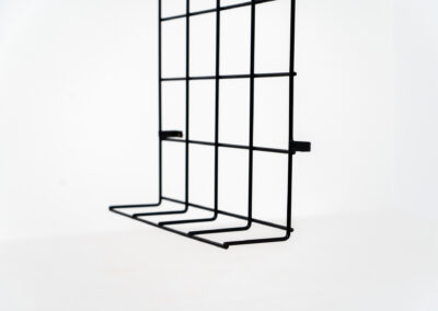 Wall-mounted wire coatrack by Karl Fichtel for Drahtwerke Erlau (Germany, 1950s). It’s made out of black metal wire and features a hat shelf, an umbrella stand and three colored hooks. It has plenty of room to hang more hooks or coat hangers if needed. It’s easily mountable to the wall with six screws. In very good condition!