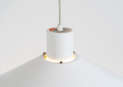 Trapez pendant light by Christian Hvidt for Nordisk Solar (Denmark, 1970s). A minimalistic design with 3 graduated shades attached to a cylindrical centre tube. Made to spread a soothing indirect light. In good condition with some visible using traces.