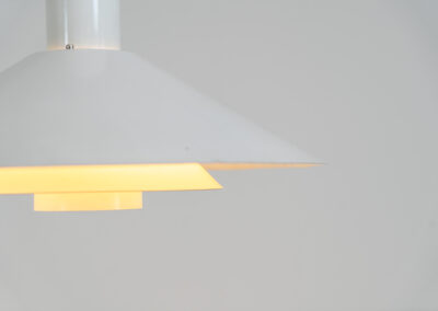 Trapez pendant light by Christian Hvidt for Nordisk Solar (Denmark, 1970s). A minimalistic design with 3 graduated shades attached to a cylindrical centre tube. Made to spread a soothing indirect light. In good condition with some visible using traces.