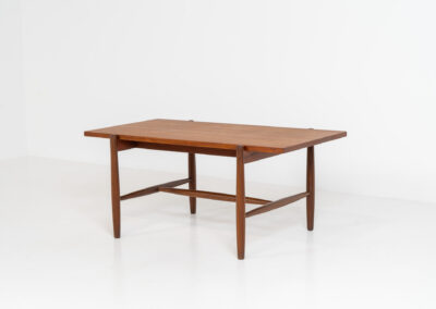 Stunning compact coffee table by Asko (Finland, 1960s). It consists of a tapered solid teak frame and a teak veneered table top. In very good condition. Labeled by maker.