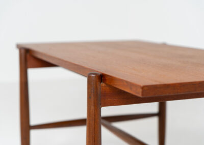 Stunning compact coffee table by Asko (Finland, 1960s). It consists of a tapered solid teak frame and a teak veneered table top. In very good condition. Labeled by maker.