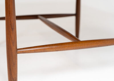 Stunning compact coffee table by Asko (Finland, 1960s). It consists of a tapered solid teak frame and a teak veneered table top. In very good condition. Labeled by maker.