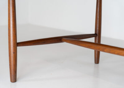 Stunning compact coffee table by Asko (Finland, 1960s). It consists of a tapered solid teak frame and a teak veneered table top. In very good condition. Labeled by maker.