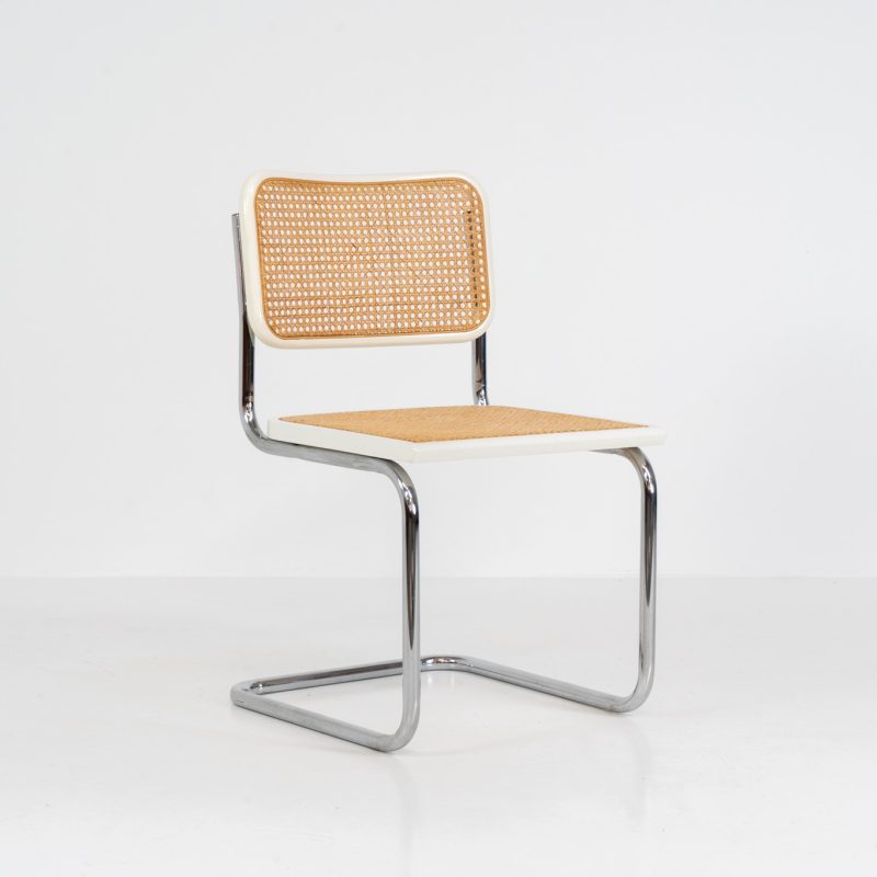 Italian wicker chair (Italy, 1970s). An iconic and contemporary design. The chair consists of white lacquered beech wood with cane webbing and a chrome frame, all in very good condition. It has a ‘made in Italy’ stamp underneath.