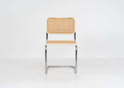 Italian wicker chair (Italy, 1970s). An iconic and contemporary design. The chair consists of white lacquered beech wood with cane webbing and a chrome frame, all in very good condition. It has a ‘made in Italy’ stamp underneath.