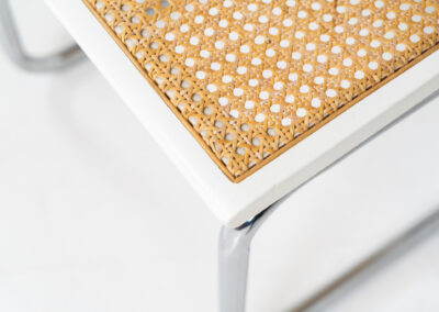 Italian wicker chair (Italy, 1970s). An iconic and contemporary design. The chair consists of white lacquered beech wood with cane webbing and a chrome frame, all in very good condition. It has a ‘made in Italy’ stamp underneath.