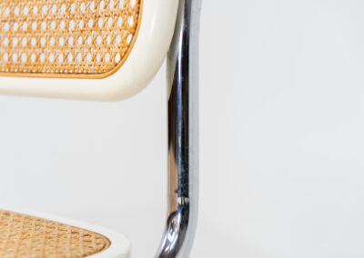 Italian wicker chair (Italy, 1970s). An iconic and contemporary design. The chair consists of white lacquered beech wood with cane webbing and a chrome frame, all in very good condition. It has a ‘made in Italy’ stamp underneath.