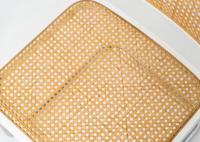 Italian wicker chair (Italy, 1970s). An iconic and contemporary design. The chair consists of white lacquered beech wood with cane webbing and a chrome frame, all in very good condition. It has a ‘made in Italy’ stamp underneath.