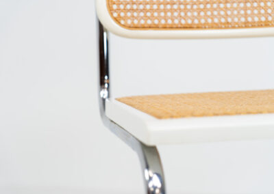 Italian wicker chair (Italy, 1970s). An iconic and contemporary design. The chair consists of white lacquered beech wood with cane webbing and a chrome frame, all in very good condition. It has a ‘made in Italy’ stamp underneath.