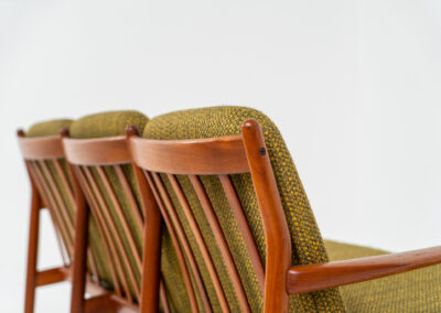 Impressive 3-seater sofa by Grete Jalk for Glostrup (Denmark, 1960s). What an eye catcher.. it features a solid teak frame which is beautifully sculpted and the original cushions! The green/yellow wool fabric is original aswell and remains in amazing condition. Obviously an example of true Scandinavian craftsmanship. It is a pleasure for the eyes and a pleasure to sit in! Marked by maker.