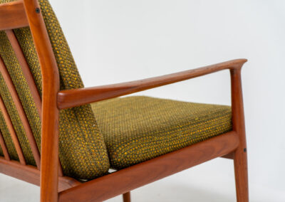 Impressive 3-seater sofa by Grete Jalk for Glostrup (Denmark, 1960s). What an eye catcher.. it features a solid teak frame which is beautifully sculpted and the original cushions! The green/yellow wool fabric is original aswell and remains in amazing condition. Obviously an example of true Scandinavian craftsmanship. It is a pleasure for the eyes and a pleasure to sit in! Marked by maker.