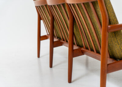 Impressive 3-seater sofa by Grete Jalk for Glostrup (Denmark, 1960s). What an eye catcher.. it features a solid teak frame which is beautifully sculpted and the original cushions! The green/yellow wool fabric is original aswell and remains in amazing condition. Obviously an example of true Scandinavian craftsmanship. It is a pleasure for the eyes and a pleasure to sit in! Marked by maker.