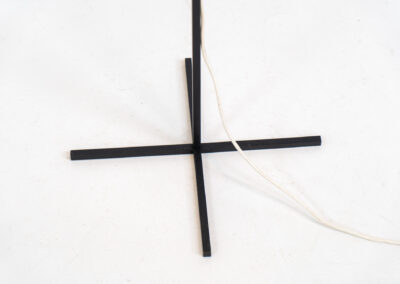 Rare minimalist floor lamp by Kaiser Leuchten (Germany, 1960s).It contains a minimalistic black base, a chrome arm and the original large fabric shade with a red & black check pattern.It is adjustable in height with a clamping mechanism. The light comes out primarily directed downwards and upwards.The lamp has a pull cord as a switch. It has 3 switching modes. The 2 burning points can be turned on and off individually, so that only one bulb burns when needed.In very good and original condition with a few sings of age and use.Labeled by maker.