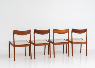 Elegant set of 4 rare dining chairs by Henning Kjaernulf for Korup Stolefabrik (Denmark, 1960s). These beauties are made of solid teak, featuring clean lines, organic curves and expert craftsmanship. They are newly upholstered in a high quality off-white cotton & hemp fabric. Fully restored and in splendid condition.