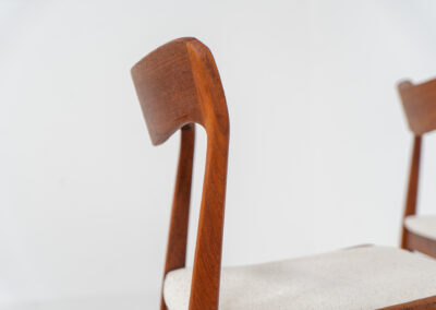 Elegant set of 4 rare dining chairs by Henning Kjaernulf for Korup Stolefabrik (Denmark, 1960s). These beauties are made of solid teak, featuring clean lines, organic curves and expert craftsmanship. They are newly upholstered in a high quality off-white cotton & hemp fabric. Fully restored and in splendid condition.